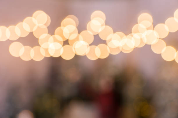 istock Blurred photo of flashlights in a snow-covered park 869773464