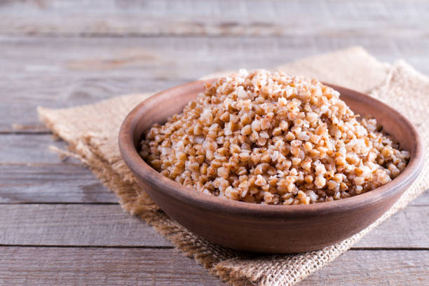 istock Boiled buckwheat porridge in a ceramic bowl 869774126
