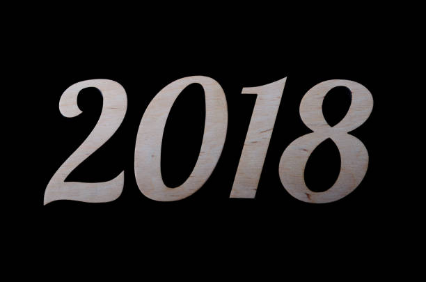 istock The inscription 2018 is isolated on a black background. 869805090