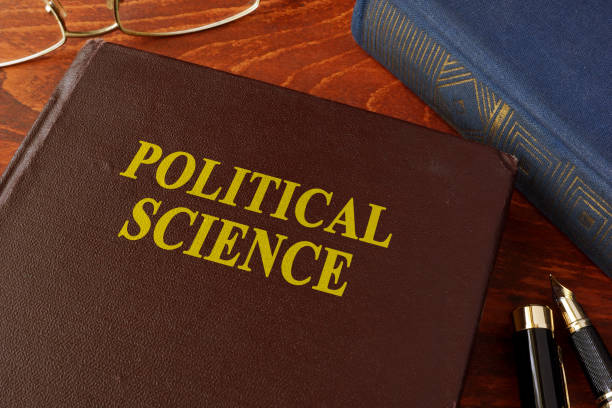 istock Book with title political science in an office. 869814616