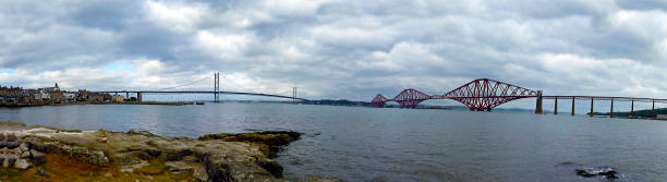 istock Scotland, panoramic views of Firth of Forth Bay and Forth Rail Bridge 869815766