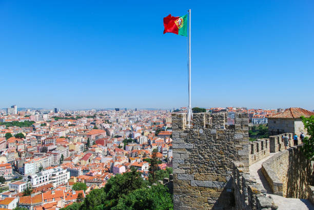 istock Portugal flag on ancient fortress 869815862