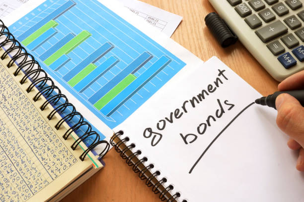 Government bonds written in a note. Trading concept. Government bonds written in a note. Trading concept. yield sign photos stock pictures, royalty-free photos & images