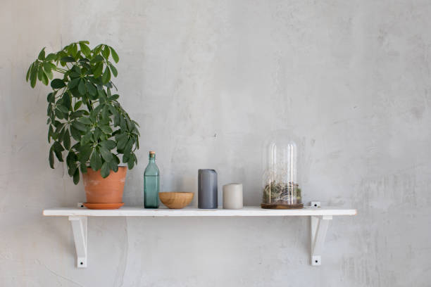 istock Wooden shelf with decor 869819590