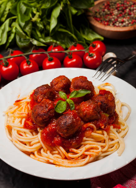 istock Spaghetti pasta with meatballs and tomato sauce 869822186
