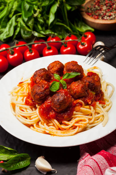 istock Spaghetti pasta with meatballs and tomato sauce 869822218