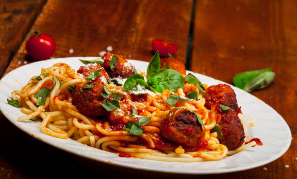 istock Spaghetti pasta with meatballs and tomato sauce 869822298