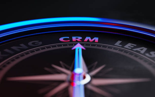 istock CRM Concept: Arrow of A Compass Pointing CRM Text 869822364