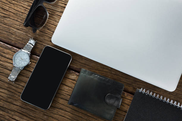 istock Various accessories on wooden floor 869838486