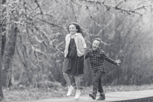 istock Sibling photo shoot in forest 869841632