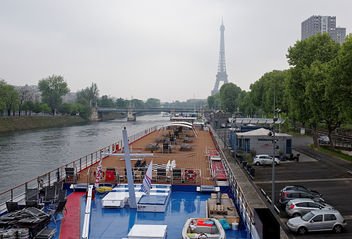 Paris; France-May 05; 2017: In the port of Grenelle there are ships and cars