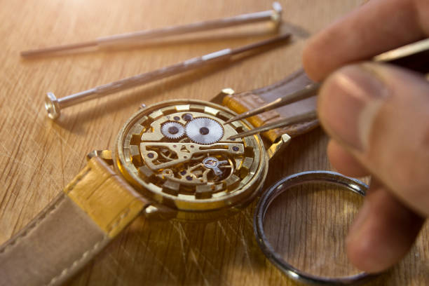 istock Mechanical watch repair 869848186