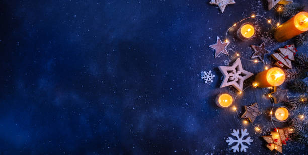 istock Christmas background with wooden decorations and candles. Free space for text 869852210