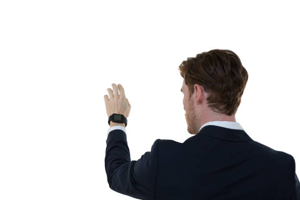 istock Businessman pretending to use an invisible screen 869858342