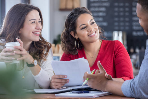 istock Confident businesspeople meet to discuss projects 869863184