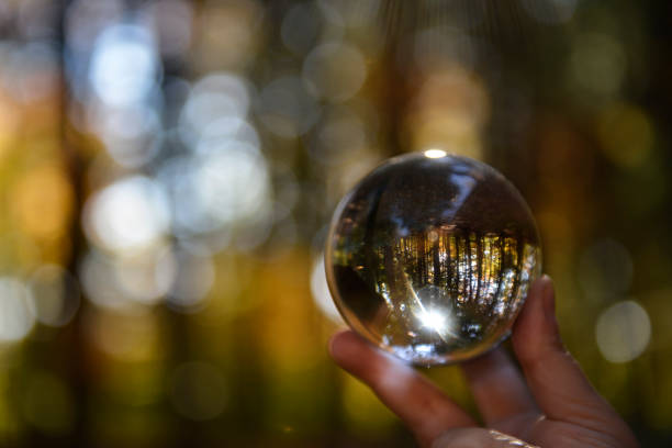 istock Crystal ball, beautiful Canadian autumn forest background 869872798
