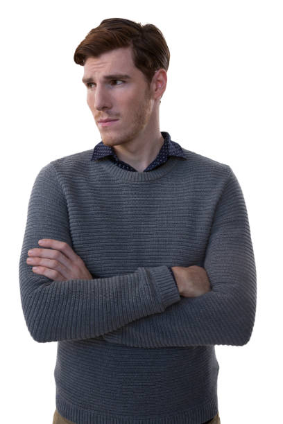 istock Male executive standing with arms crossed 869875802