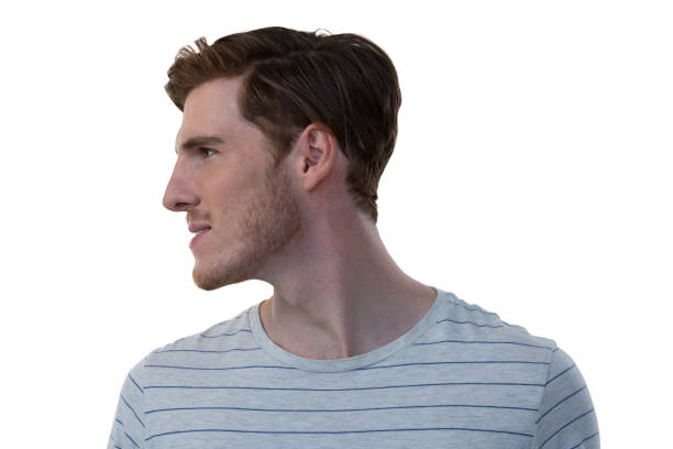 istock Male executive standing against white background 869875944