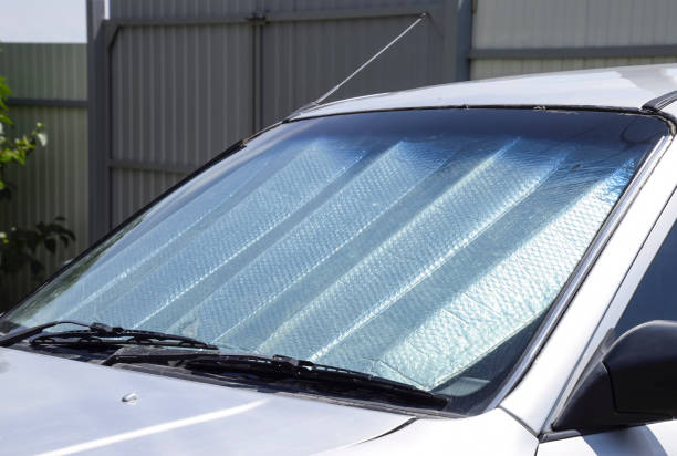 istock Sun Reflector windscreen. Protection of the car panel from direc 869886192