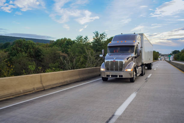 istock Big rig 18 wheeler truck on road 869893682