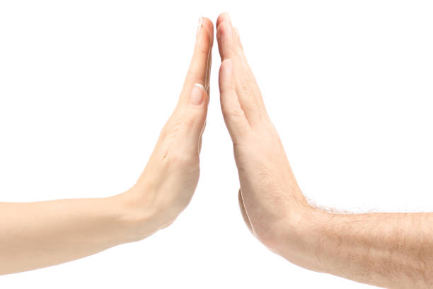 istock High five female and male hand isolated 869893806