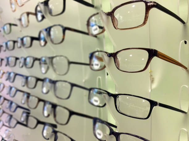 istock Eyeglasses in optician store background 869896824
