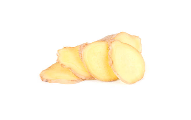 istock Slice of fresh ginger isolated on white background. Close up 869899040