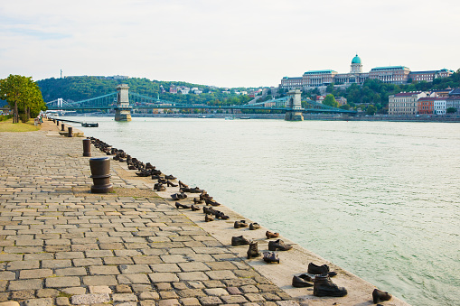 Budapest, Hungary - August 31, 2012: Holocaust Memorial, Buda Castle and Chain Bridge over the Danube River in Budapest, Hungary