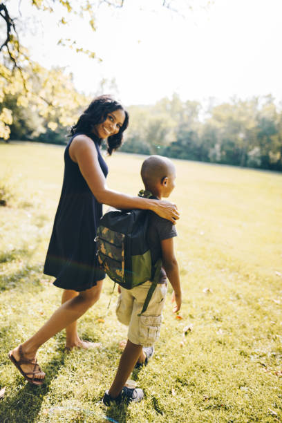 istock mom talking with his soon before school 869921824