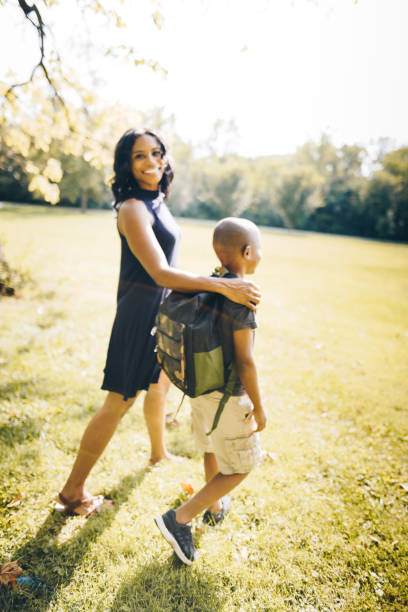 istock mom talking with his soon before school 869921844