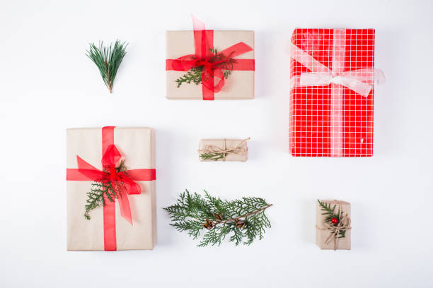 istock Christmas composition. Gift, christmas decoration, cypress branches, pine cones on white background 869936100