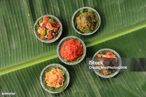 Five Indonesian Chili Relishes In Mini Stoneware Mortars Stock Photo - Download Image Now