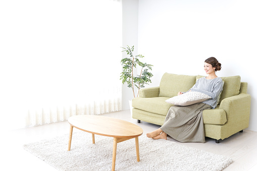 woman watching TV at home