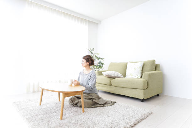 istock woman drinking coffee at home 869942848