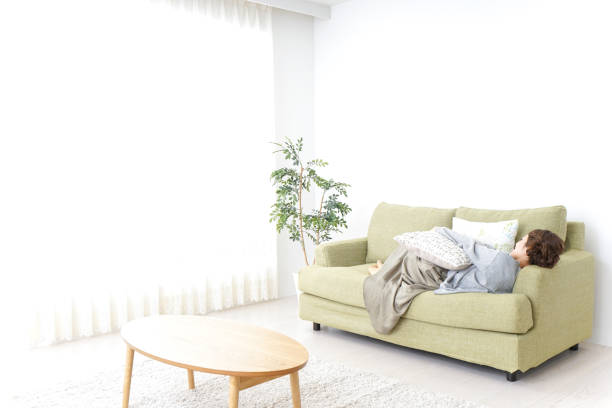 istock sleeping woman at home 869943534