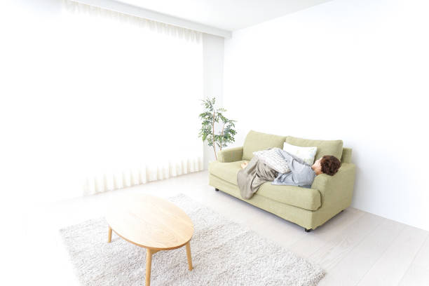 istock sleeping woman at home 869943550