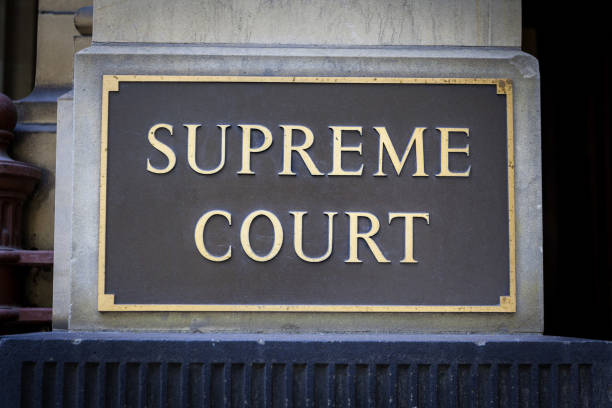 Supreme Court sign on a pillar closeup stock photo