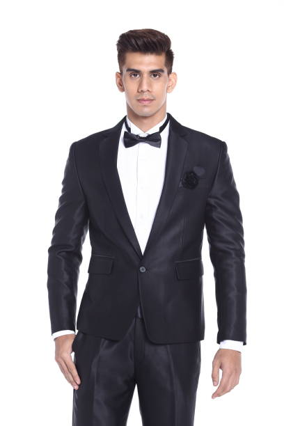 istock Figure, Business Man Stand in dark Blue Black Suit 869951326