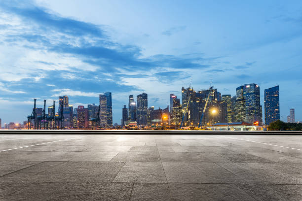 istock empty marble floor with modern city at twilight 869954024