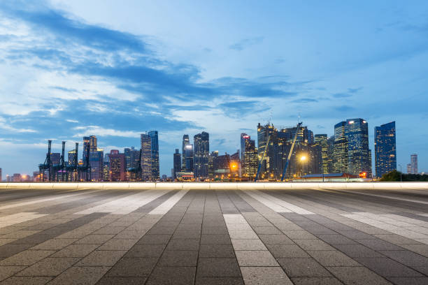 istock empty marble floor with modern city at twilight 869954162