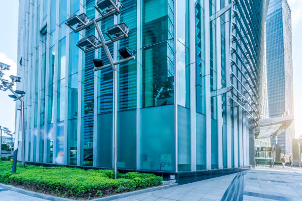 istock Low angle view of skyscrapers architectural glass 869964304
