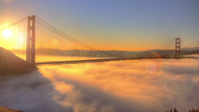 Golden Gate Bridge Spectacular Sunrise with low Fog.