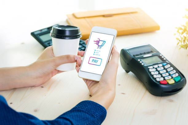 istock Mobile Payment with NFC technology  on Smartphone shopping online with filter effect 869967000