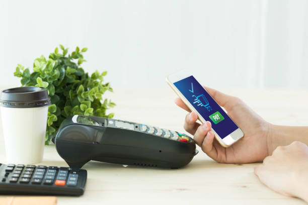 istock Mobile Payment with NFC technology  on Smartphone shopping online with filter effect 869967020