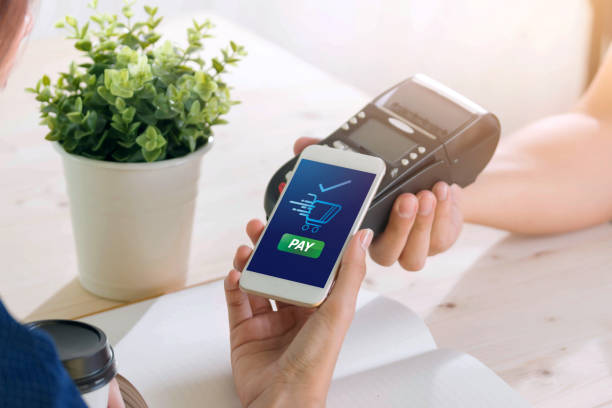 Mobile Payment with NFC technology  on Smartphone shopping online with filter effect Mobile Payment with NFC technology  on Smartphone shopping online with filter effect digital wallet photos stock pictures, royalty-free photos & images