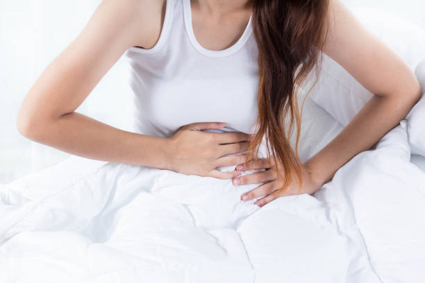 istock female stomachache Because Poisonous food 869970100