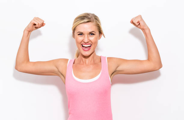 istock Powerful young fit woman 869973700