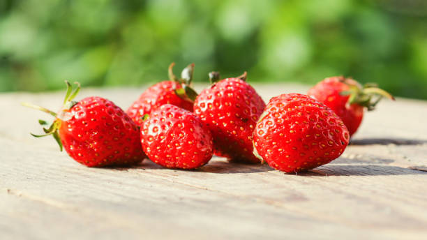 istock Ripe juicy strawberries 869973748