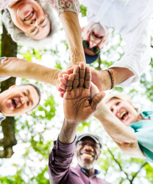 istock Group Of Senior Retirement Exercising Togetherness Concept 869974858