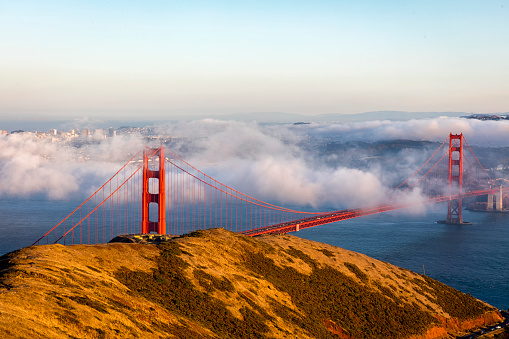 California- San Francisco- Large Format panoramic view of the fogged in Golden Gate bridge as seen from across the bay in Marin county.